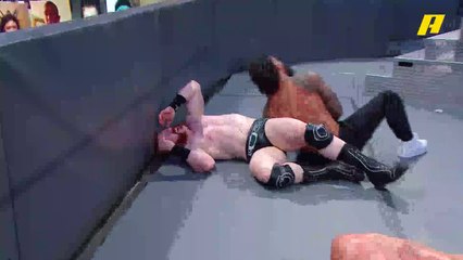 أوسو يقفز فوق الحبل ويرمي نفسه على شيموس وريدل