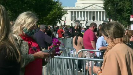 Mourners remember Justice Ginsburg as she lies in repose at US Supreme Court