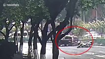 Helmets save motorcyclists' lives after out-of-control SUV knocks them over in China