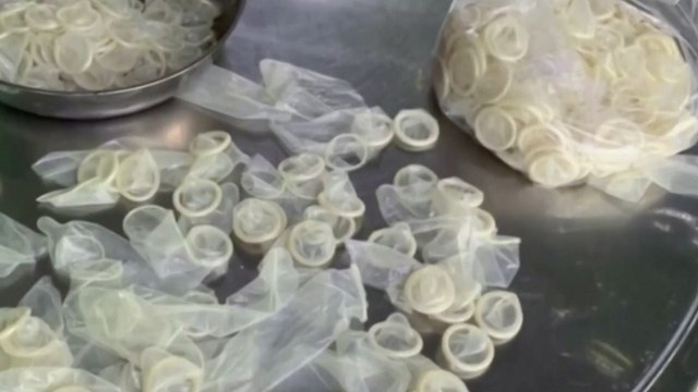 Vietnamese police raid warehouse that resells recycled condoms