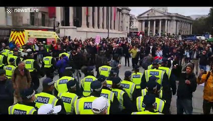 Scores of police move into Trafalgar Square to break up anti-lockdown protest