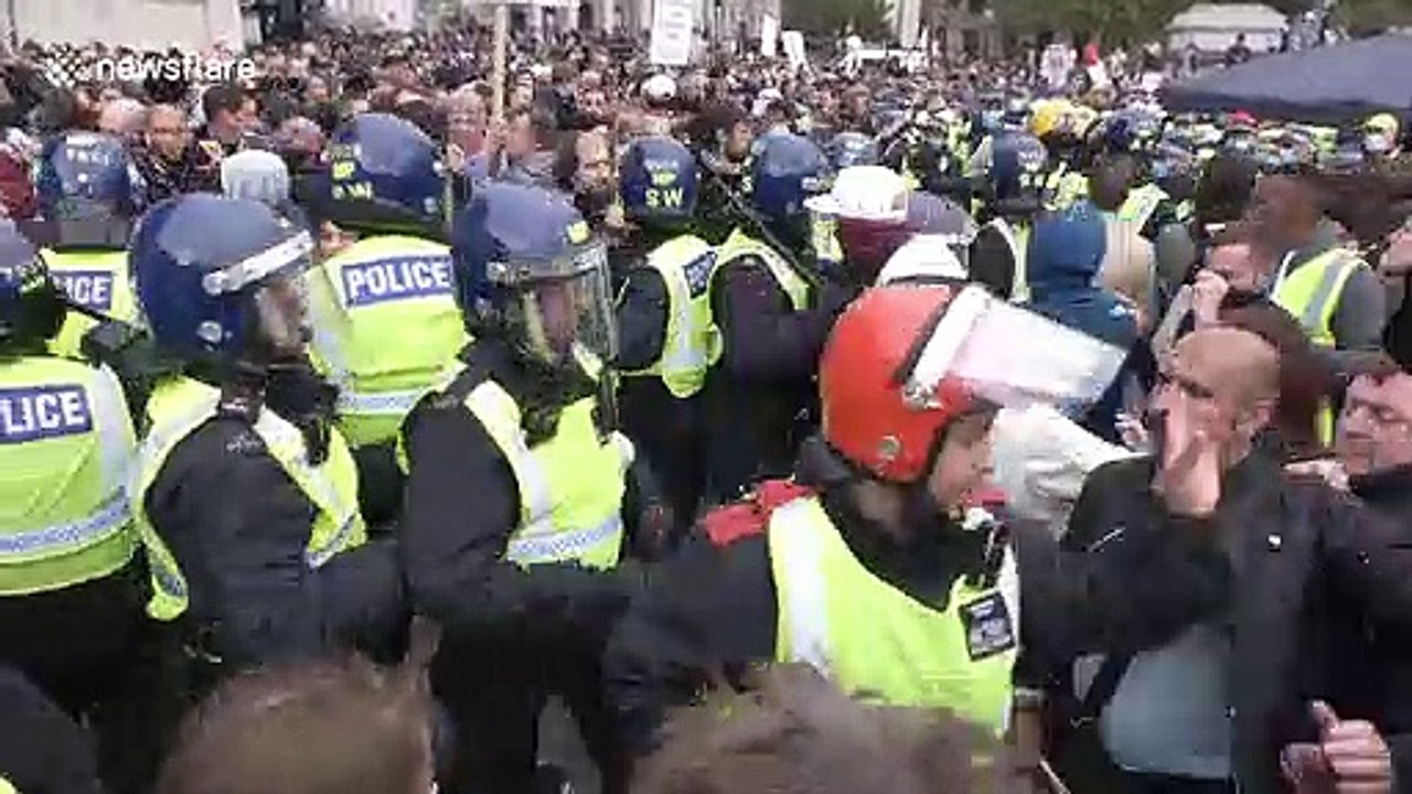 Gent in cricket whites takes part in bloody and violent protest in London