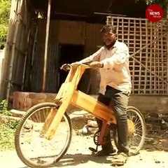 Madurai based carpenter makes a wooden cycle for his son