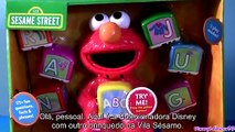 TOYSBR Aprenda o ABC Alfabeto em inglês com o Boneco Elmo da Vila Sésamo em Portugues BR