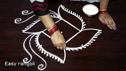 creative simple ,fish rangoli ,designs with 5x1 dots