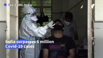 People get tested in Delhi as India coronavirus cases pass 6 million
