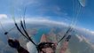 Paraglider Flies High Over Scenic Landscape