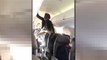 Woman's profanity filled meltdown on flight to Detroit caught on camera