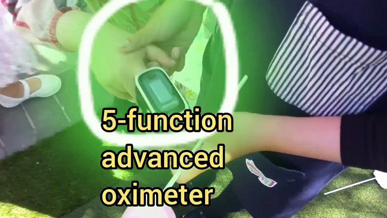 a smart 7-year-old runs the "Triage" at Vancouver General Hospital-ity, infrared thermal imager temperature checks, blood oxygen, perfusion index, heart rate, pleismograph, fever symptom scan on the wrist, assisted by a Vancouver Thermographer.
