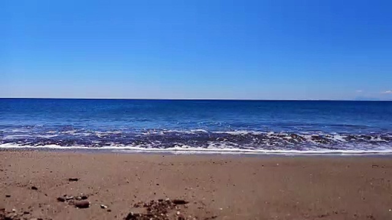 Beach Aerial shot over a sandy coastline natural beautiful royalty Free Stock no copyright video Free for commercial use dron dron aerial view (2)