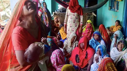 UP police forcibly cremating Hathras victim at night