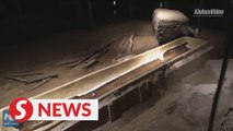 8,000-year-old canoe on display at museum in Hangzhou, China