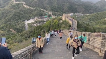 Sin miedo pero con mascarilla, China vuelve a viajar en masa
