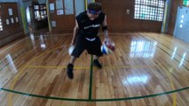 Guy Dribbles Two Basketballs Together