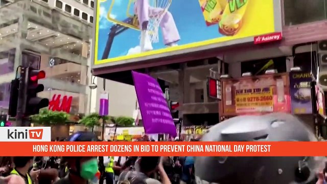 Hong Kong police arrest dozens in bid to prevent China national day protest