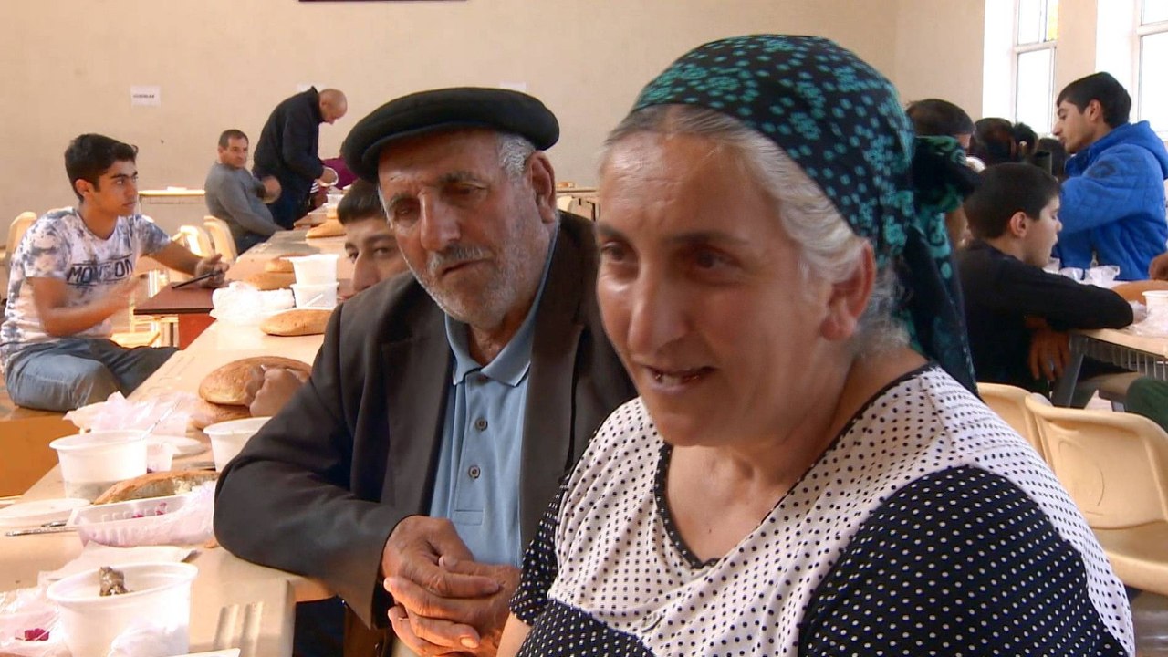 Nagorno-Karabakh fighting: Displaced families shelter in schools