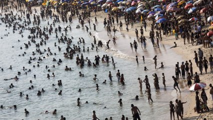 Rio de Janeiro’s beaches fill up as COVID restrictions ease