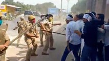 Hathras: Police lathi charge on RLD-SP workers