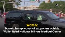 Donald Trump waves at supporters outside Walter Reed National Military Medical Center
