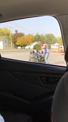 Man Rides in a Canoe Pulled by a Bike