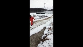 truck trying to get up a hill in the snow - VID ID - VIDID