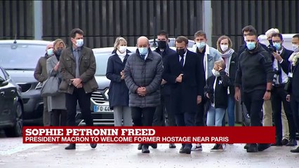 President Macron welcomes former hostage Sophie Petronin near Paris