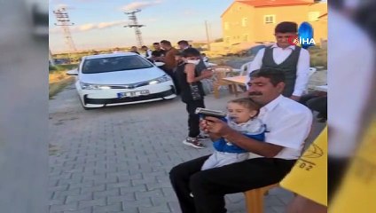 Torununun eline silah verip ateş ettirdi, gözaltına alındı