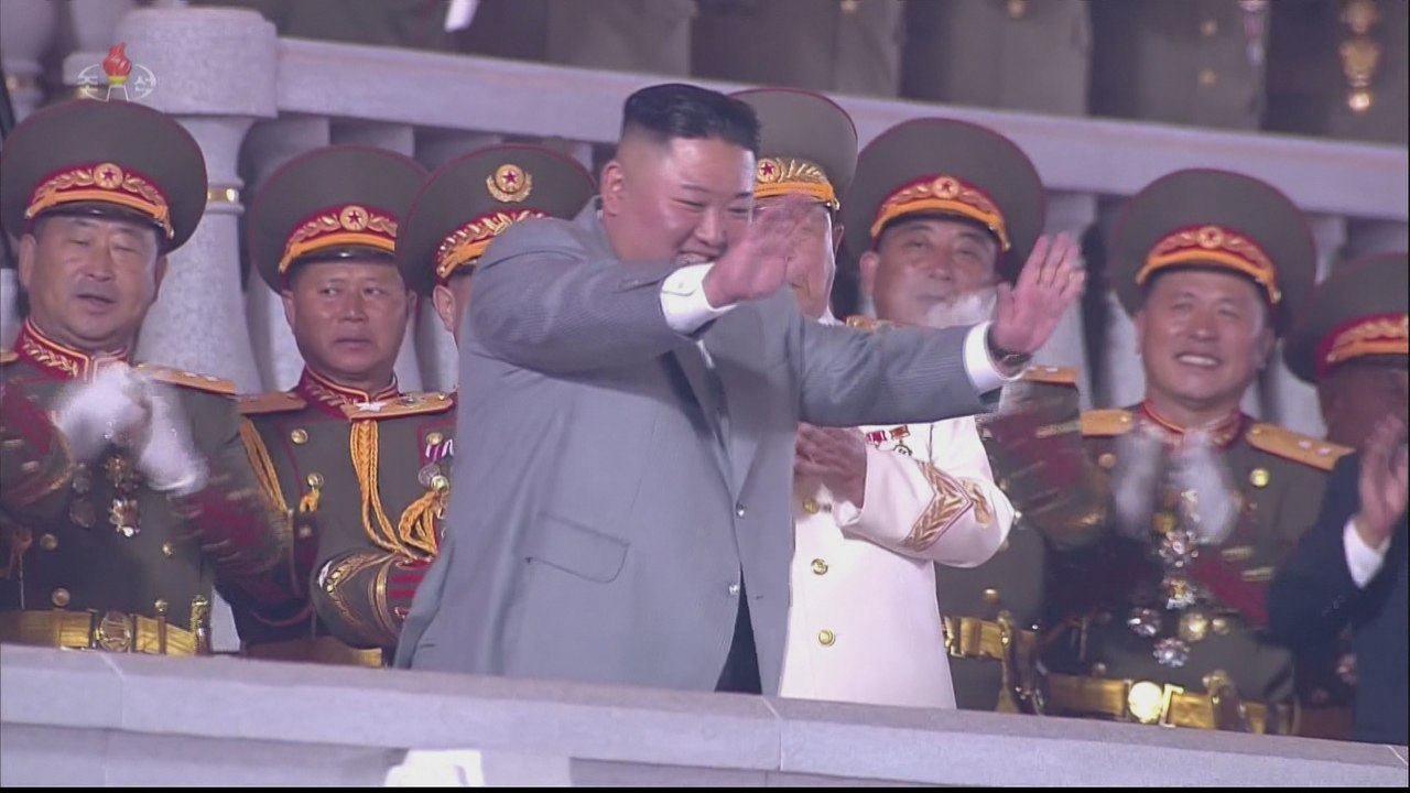 North Korea holds rare military parade, Kim Jong Un addresses