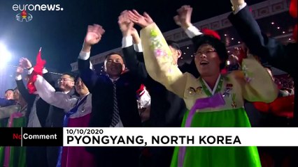 North Korea shows off giant missiles at huge military parade