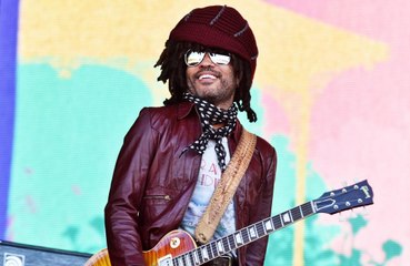 Why was Lenny Kravitz reluctant to write his book?