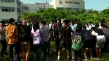 Nine arrested on suspicion of helping 12 flee Hong Kong