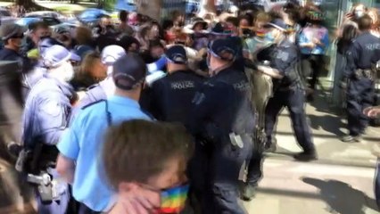 Transgender rights protesters clash with police