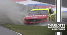 Blaney plows the infield grass while leading at the Roval