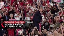 Negatif Corona, Trump Lempar Masker ke Pendukung