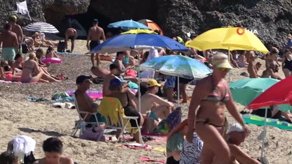 Hava ve deniz suyu sıcaklığı eşitlendi, tatilciler soluğu plajda aldı