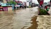 Heavy rains flood streets and highways in India
