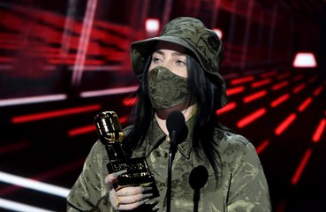 Billie Eilish wants people to wear their mask as she speaks at the Billboard Music Awards