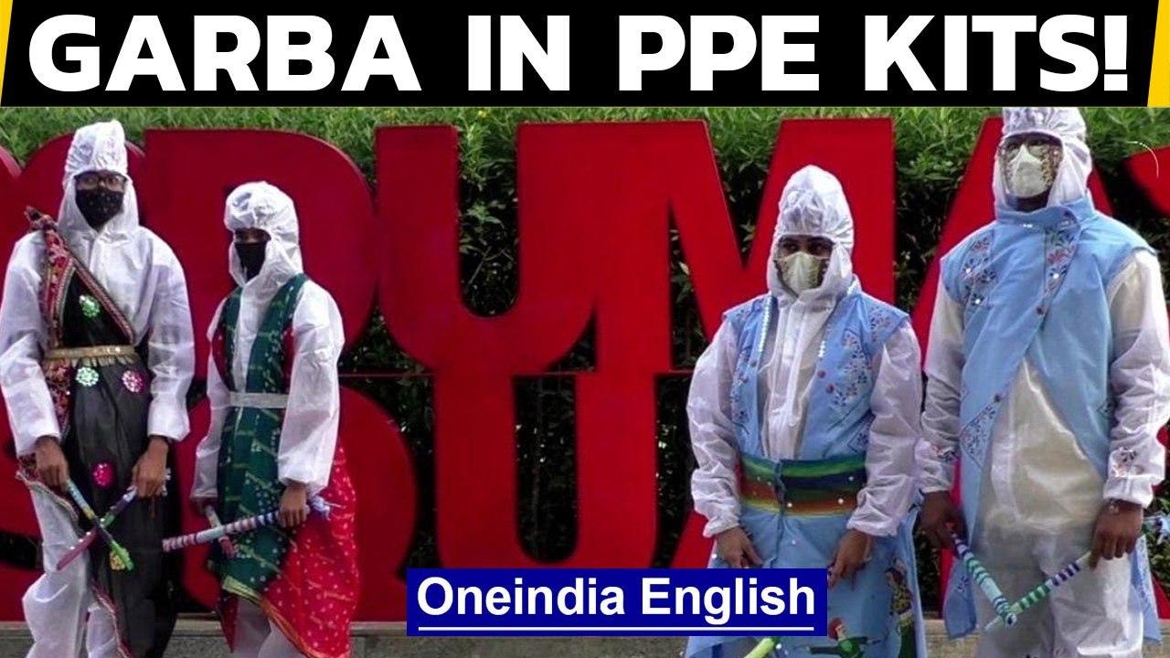Surat: Students perform ‘Garba’ donning designer PPE kits: Watch the video | Oneindia News
