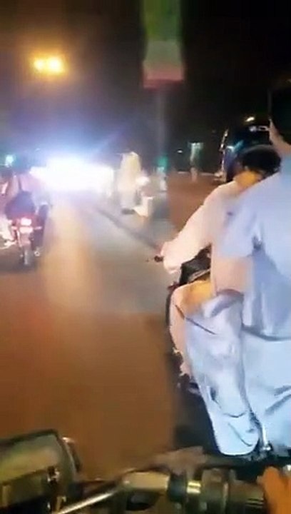 Man transport brand new motorcycle with one hand