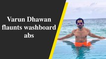 Varun Dhawan flaunts washboard abs