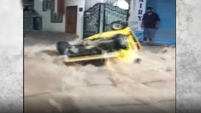 Hyderabad: Auto rickshaw-car swept away in flooded streets