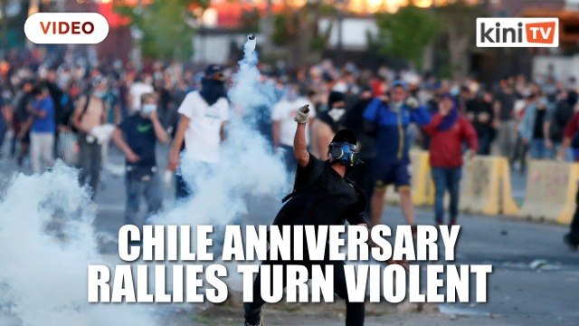 Chile anniversary rallies turn violent as churches burned, police fire tear gas