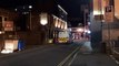 Paramedics transport man to hospital after he collapses outside club