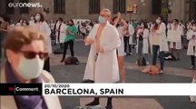 Young doctors in Barcelona take off clothes to highlight concerns