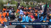 Pastikan Peserta Demo Terapkan Protokol Kesehatan, Mahasiswa Bagikan Masker