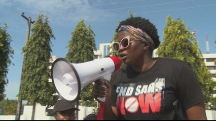 Nigeria president warns protesters; fails to address shooting