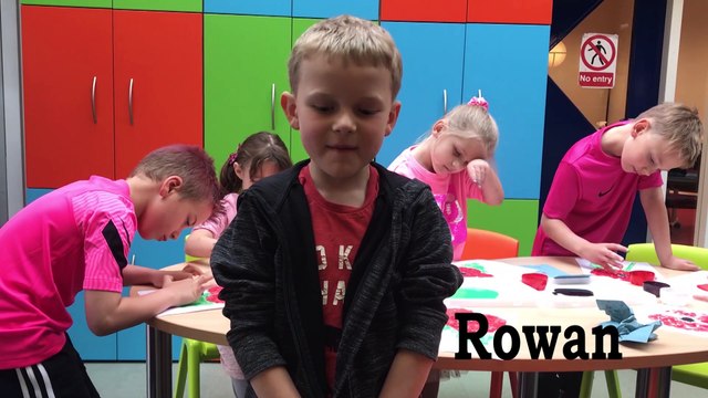 Tarleton CP School pupils painting poppies to put in their windows