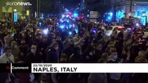 Protests in Italy as coronavirus curfews come into force