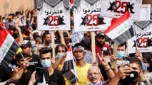 متظاهرون عراقيون يحيون الذكرى الأولى لانتفاضة تشرين