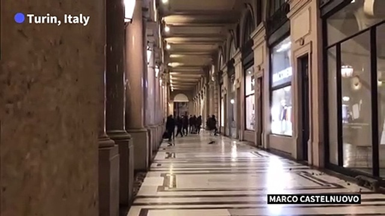 Protesters smash store windows in Turin in demonstration against virus restrictions